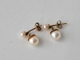 A pair of pearl ear studs, 9ct