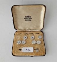 A part set of 9ct white gold enamel and sapphire stud and cufflink set in fitted box