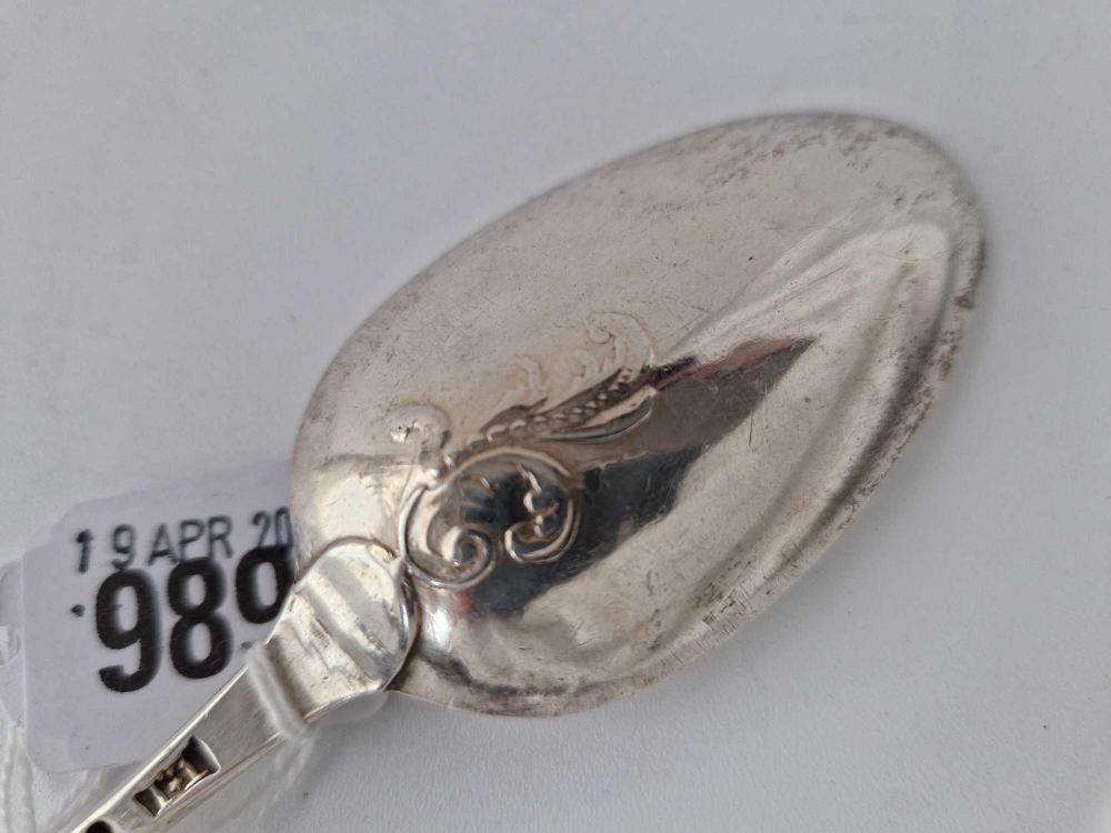 An early George III bottom marked Hanoverian pattern table spoon with scroll back, London 1774 by - Image 5 of 5