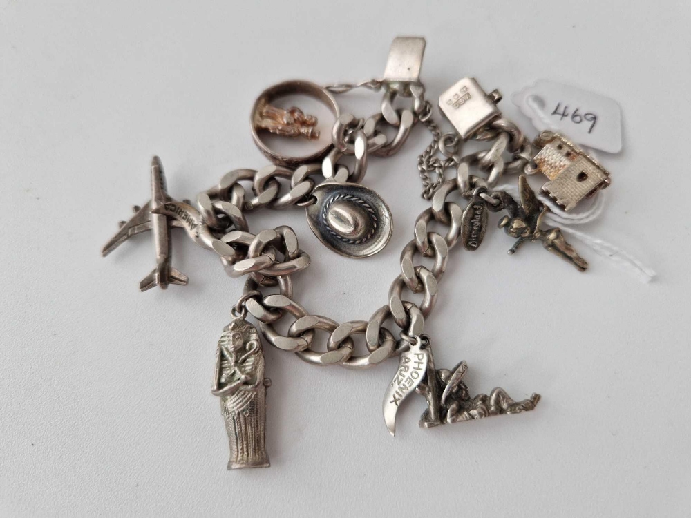 A silver charm bracelet 55 gms