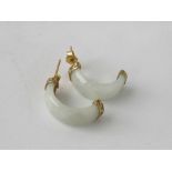 A pair of white jade half hoop 9ct earrings