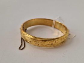 A rolled gold bangle