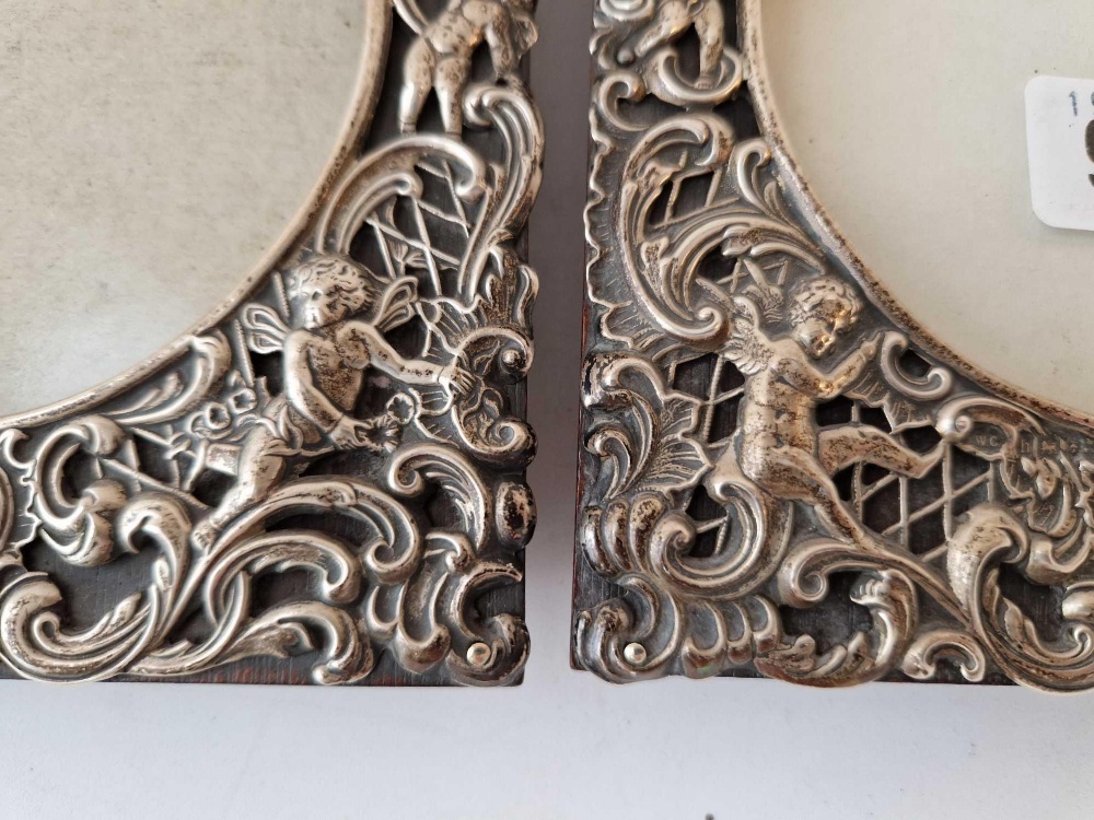 A good pair of decorative photo frames pierced and embossed with scrolls and cherubs, 6" high, - Image 2 of 3