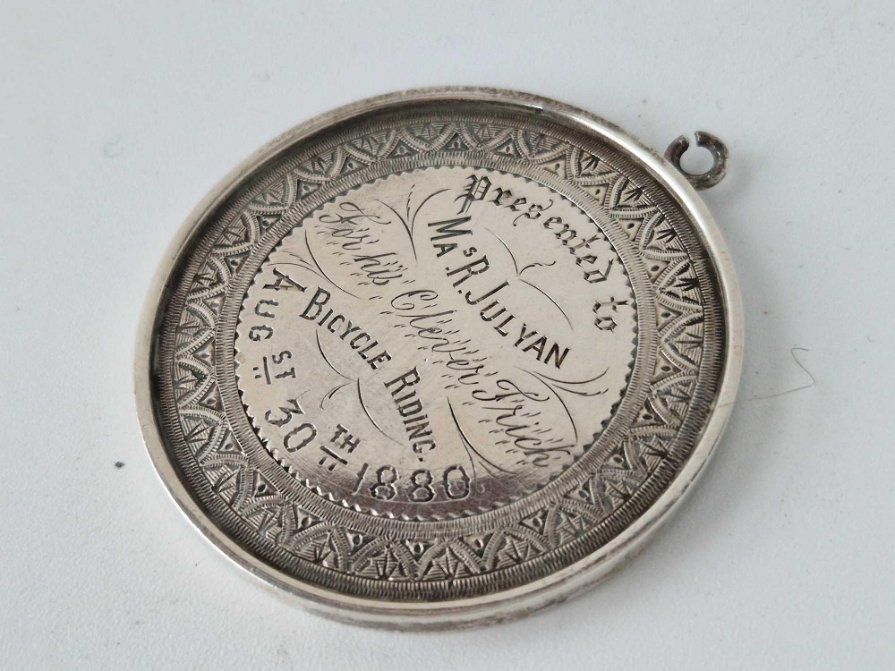 A silver large medal for bicycle riding for 1880 and inscribed for his clever trick, 2 inches - Image 2 of 3