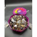 Heavy tub of world coins