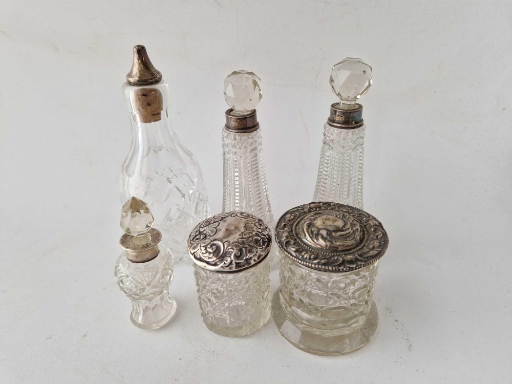 A pair of silver scent bottles