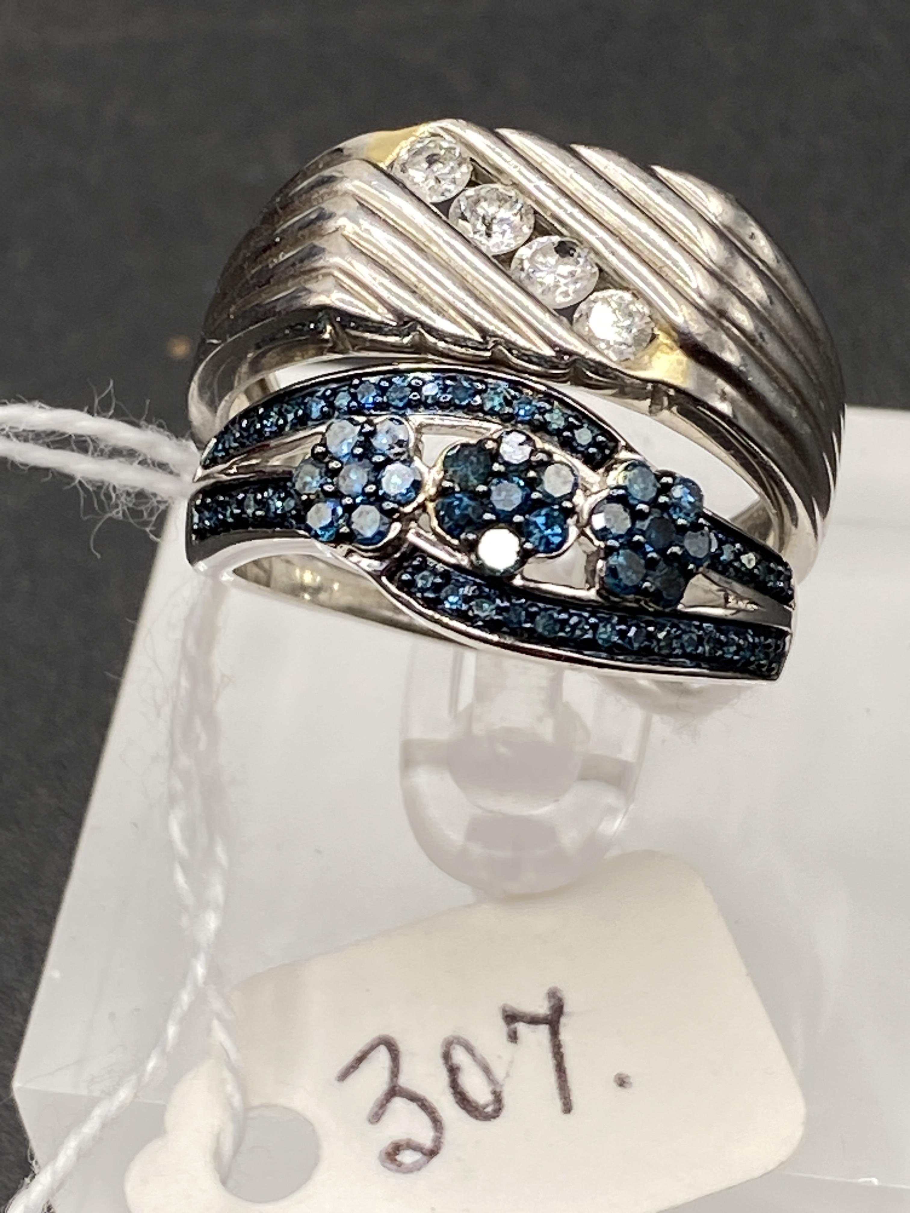 Two silver and diamond rings blue diamond and signet ring