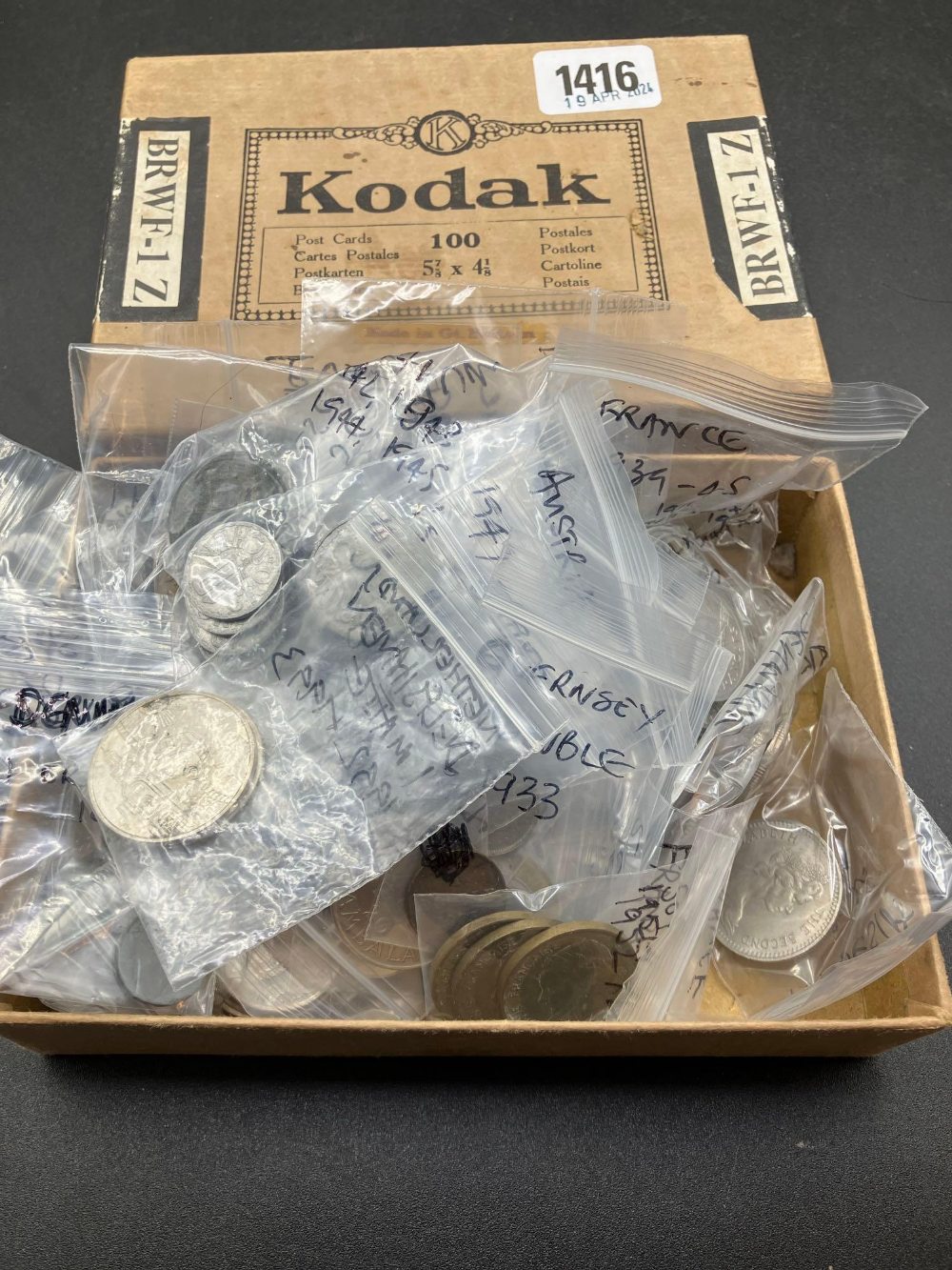 Kodak box of coins and packets