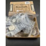 Kodak box of coins and packets