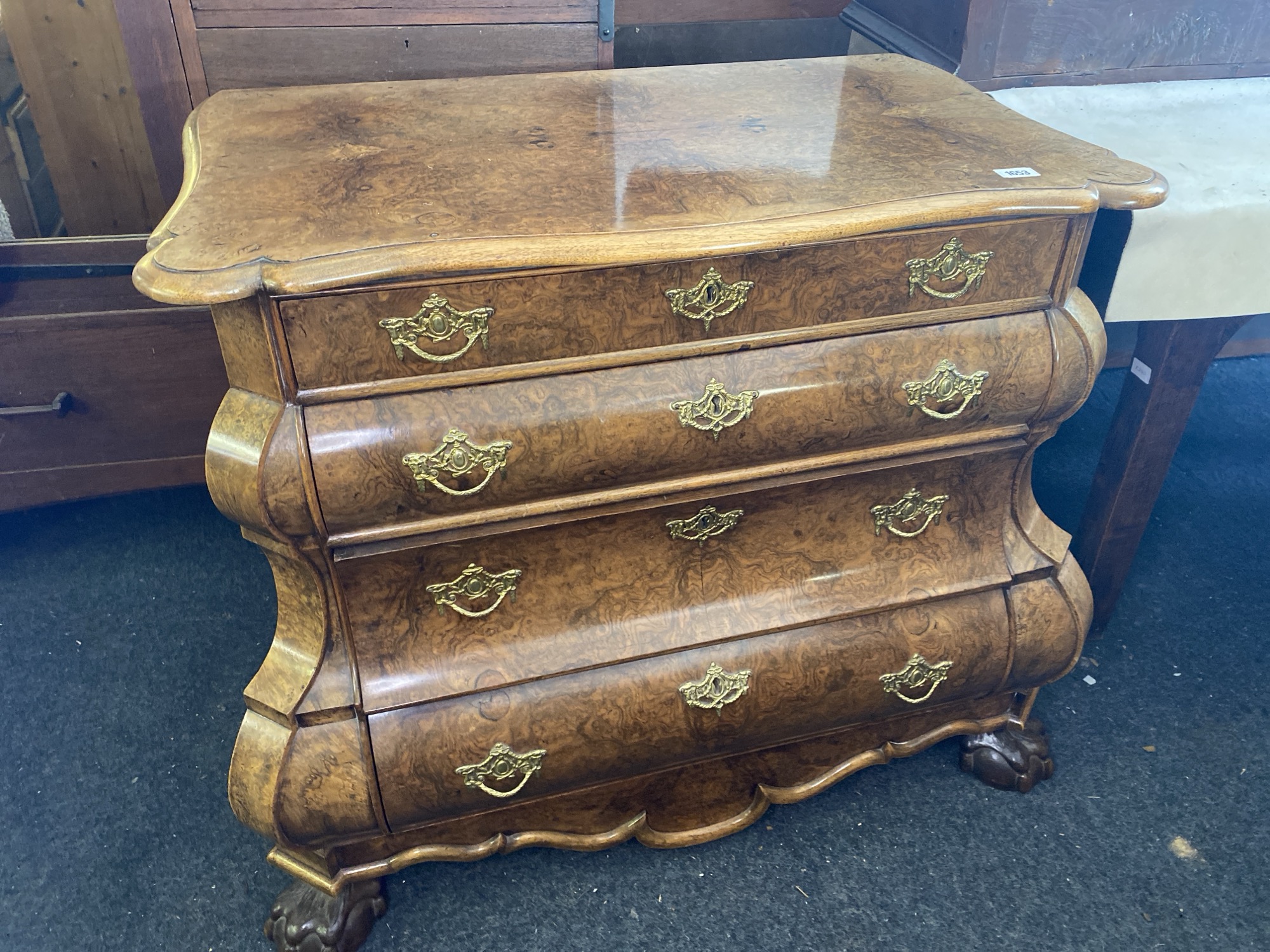 Dutch burr walnut chest with double Bombe front on spreading feet