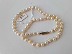 A row of pearls with 9ct clasp 17 inch