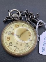 A military pocket watch g s t p F062487 with metal albert W/O