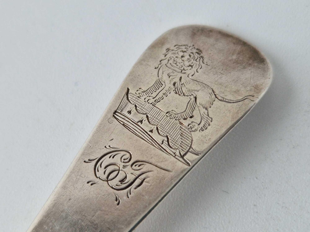 An early George III bottom marked Hanoverian pattern table spoon with scroll back, London 1774 by - Image 3 of 5