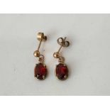 A pair of 9ct and red stone earrings 1.2g