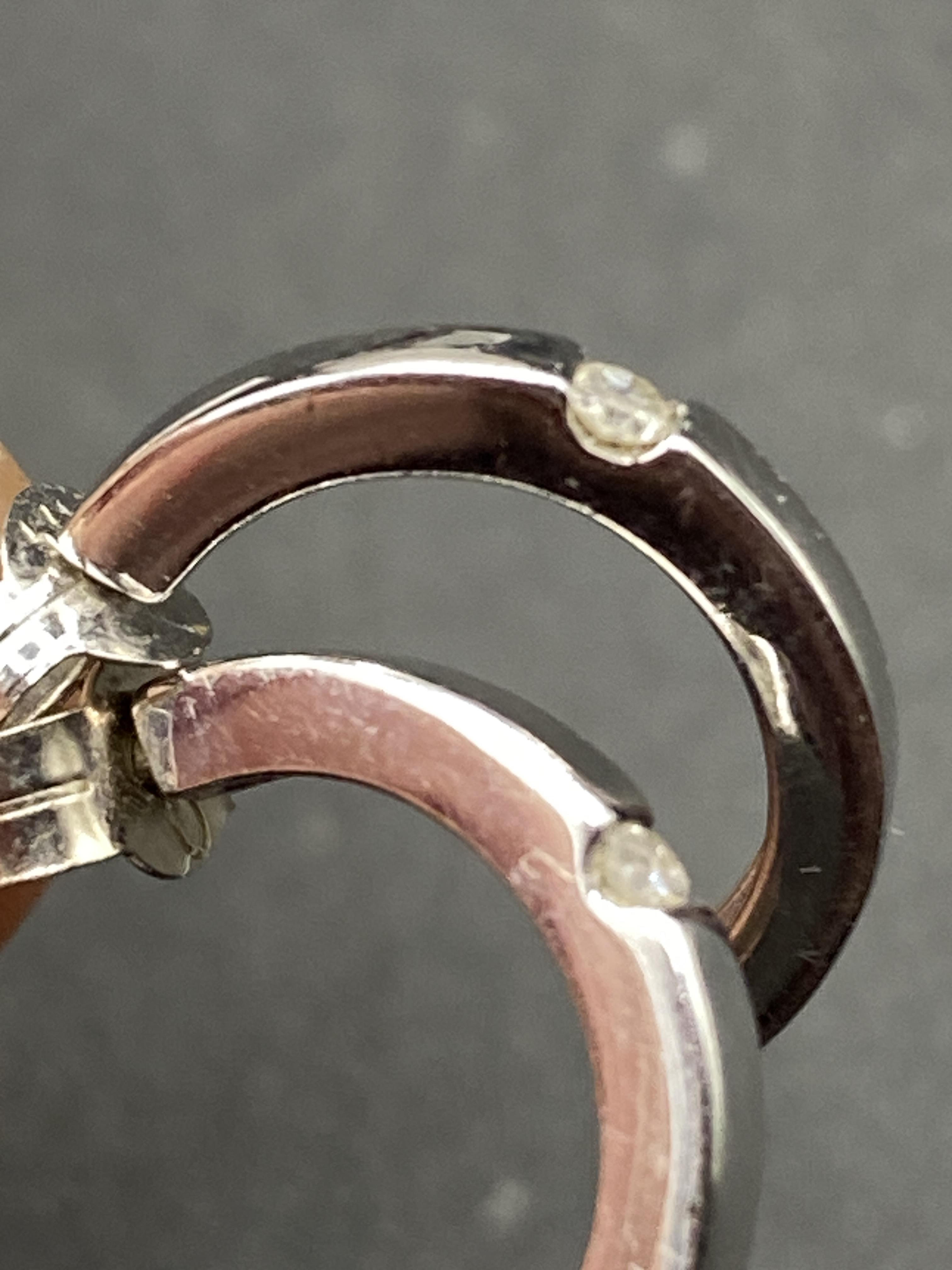 A pair of half hoop diamond 9ct earrings 1.5g - Image 2 of 3