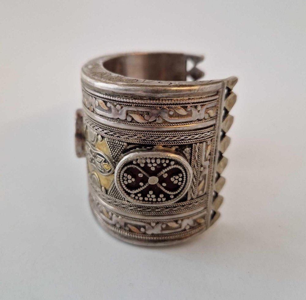 A large ethnic silver bangle - Image 2 of 3