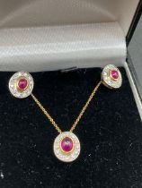 A VINTAGE DIAMOND AND CABOCHON RUBY EARRINGS AND PENDANT SET 18CT GOLD 8 GMS