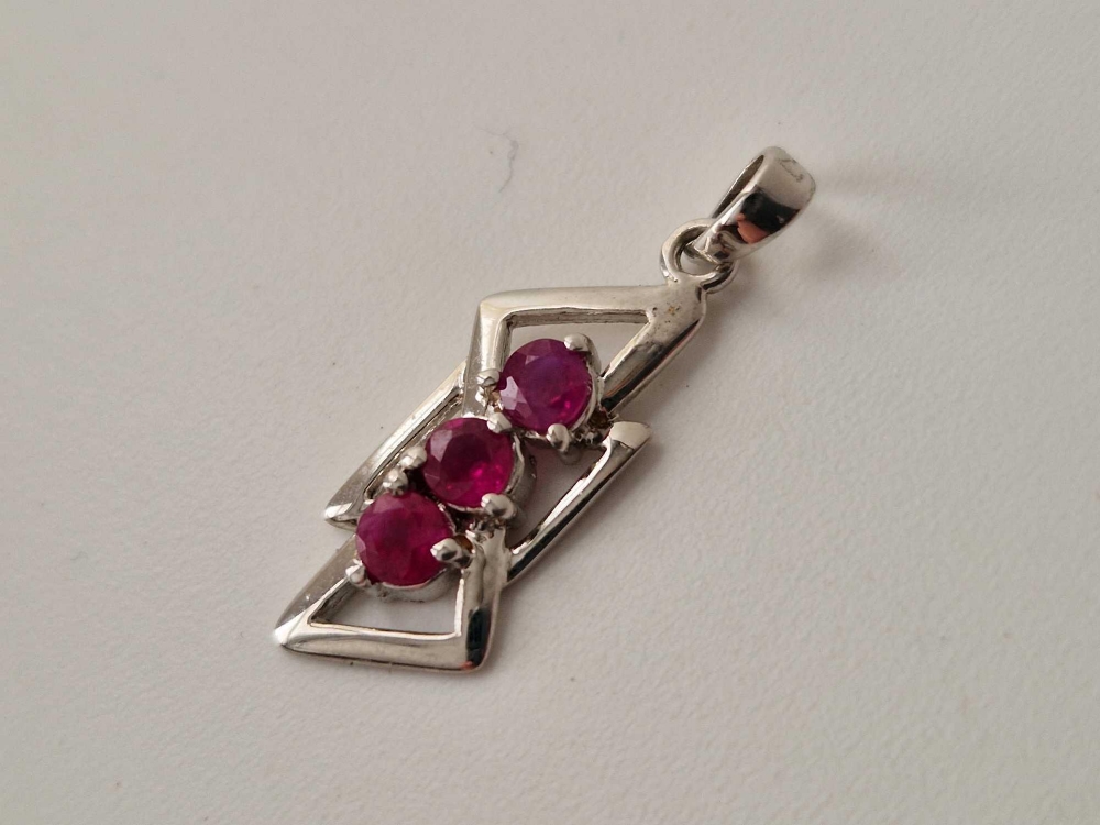 A white gold ruby pendant, 18ct