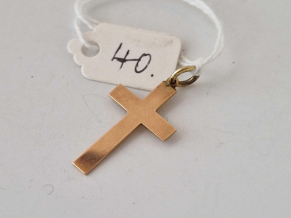 A plain 9ct cross, 1.2 g