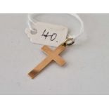 A plain 9ct cross, 1.2 g