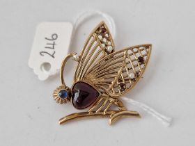 1950s butterfly brooch with central heart shaped garnet, Sapphire eye, with further garnet and pearl
