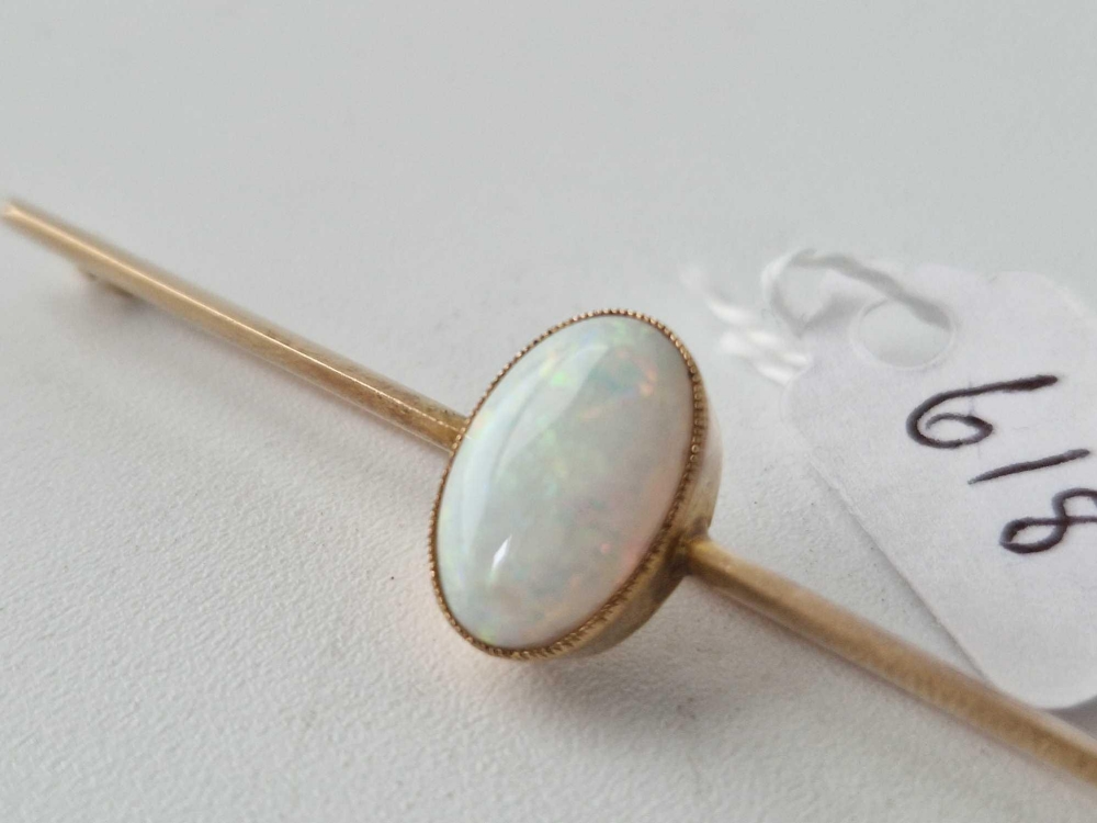 Edwardian 15ct bar brooch set with a central oval opal - Image 2 of 3