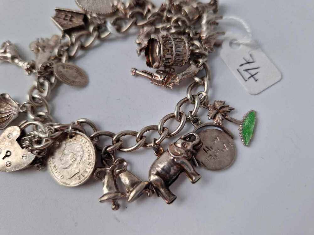 A silver charm bracelet with 16 silver charms 47.4g - Image 2 of 4