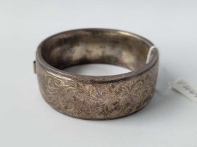 A silver hinged bangle, 44 g