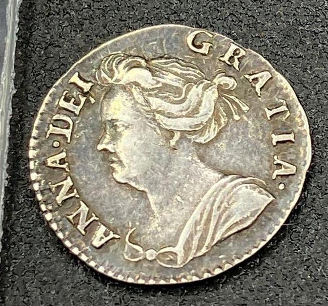 A 1713 silver penny better grade