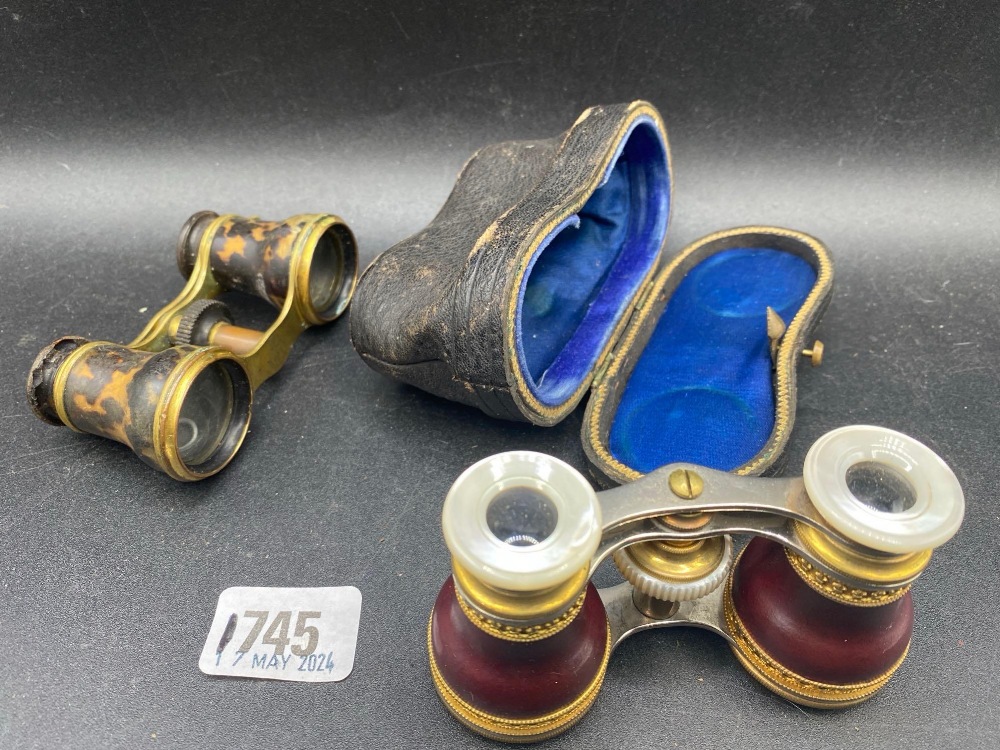 Pair of French opera glasses and another pair, one pair in case