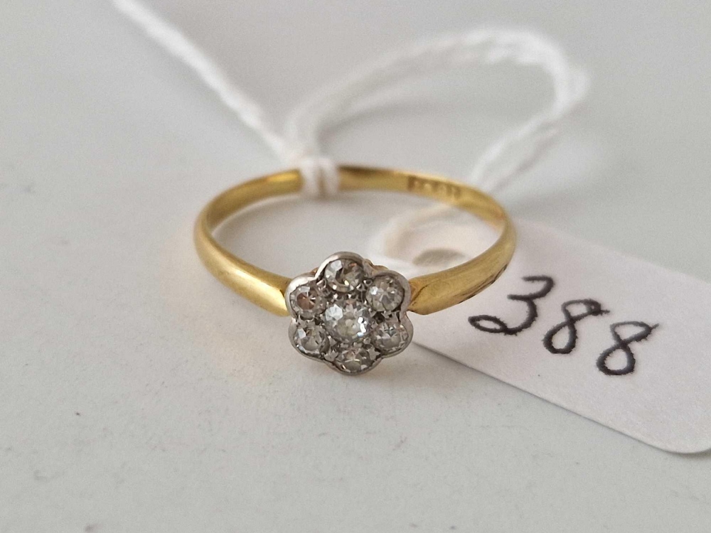 A daisy head diamond cluster ring 18ct gold size N.5 1.6 gms