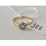 A daisy head diamond cluster ring 18ct gold size N.5 1.6 gms