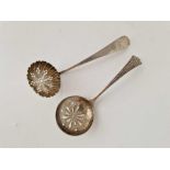 Two more sifter spoons , one with shell bowl . Scottish By I Z