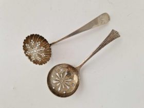 Two more sifter spoons , one with shell bowl . Scottish By I Z