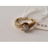 A diamond ring marked 0.25 9ct size K 2.9 gms