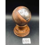 Silver mounted cricket ball with plaque on turned wood stand