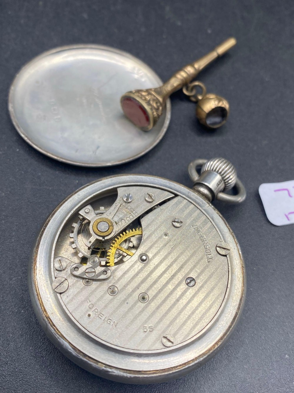 A silver INGERSOLL pocket watch with gilt key and seconds dial - Image 2 of 2