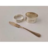 Two napkin rings and a plain butter knife. 70gm