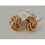 A good pair of swirl knot earring s 9ct 4.8 gms