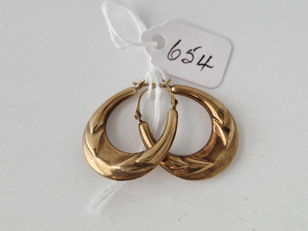 A pair of hoop earrings 9ct 1.7 gms