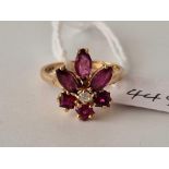 A attractive ruby and tourmaline floral and diamond ring 9ct size N - 3 gms