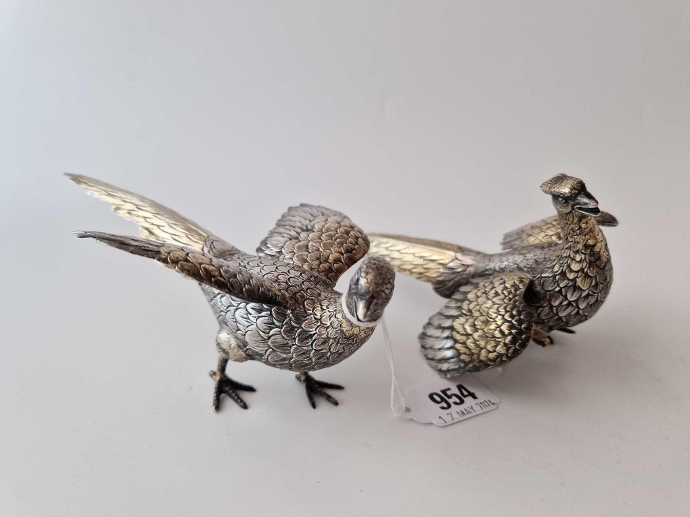 A pair of pheasants with tooled gilt plumage, 7 inches long, Import mark for London 1974, 320 g