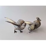 A pair of pheasants with tooled gilt plumage, 7 inches long, Import mark for London 1974, 320 g