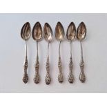 Set of six ornate continental spoons with chased stems 145 gms