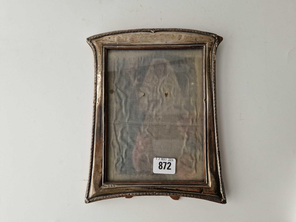 A photo frame with decorated rim, 9.5" high, Birmingham 1921