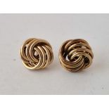 A pair of knot ear studs 9ct 1.3 gms