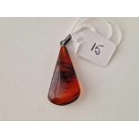 A small amber pendant