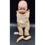 German A M bisque faced doll. Loose arms