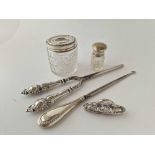 Two silver topped jars, a button hook etc