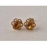A pair of stone set stud earrings 9ct 1.4 gms